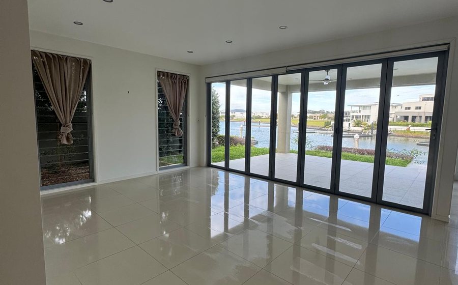 Premium waterfront living room cleaned by Luxemint on the Gold Coast